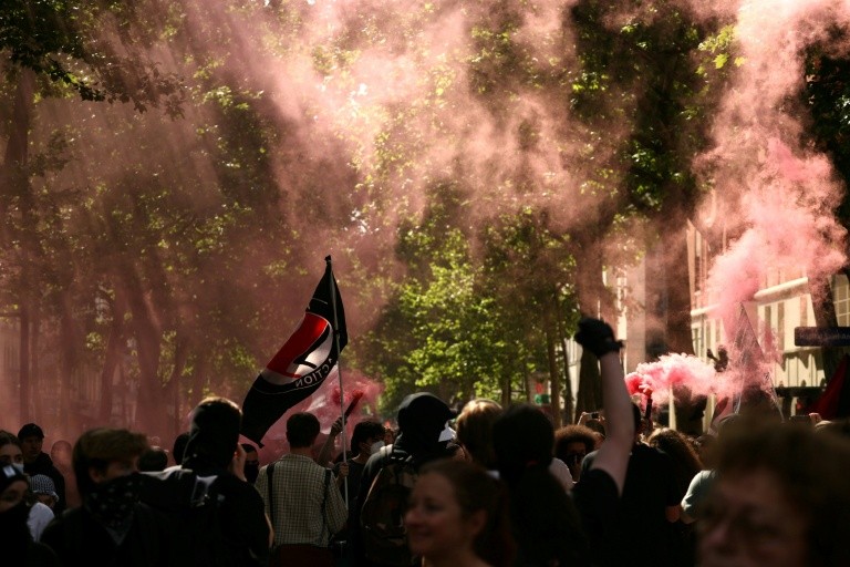 Some protesters were carrying far-left anti-fascist flags