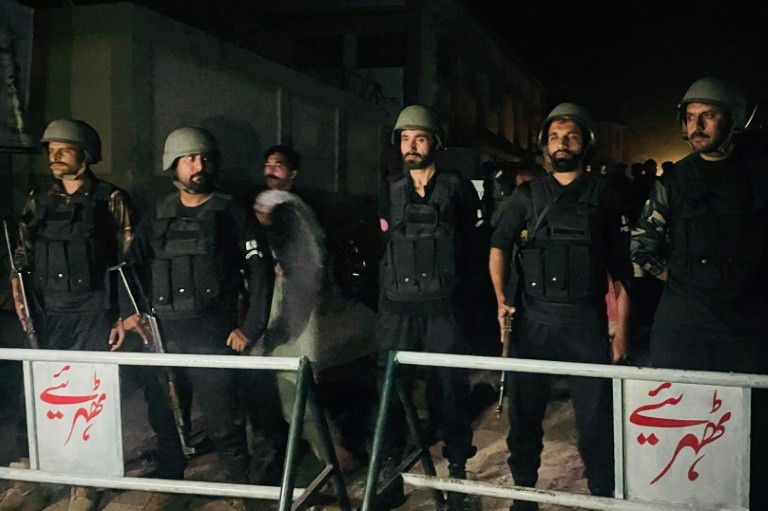 Security personnel cordon off a street near the site of an Indian strike in Muzaffarabad, the capital of Pakistan-administered Kashmir, on May 7, 2025