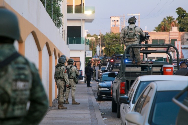 Mexican soldiers patrol the streets of Culiacan, the state capital of cartel bastion Sinaloa