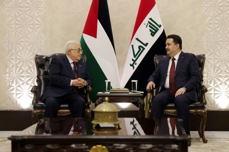 Iraqi Prime Minister Mohammed Shia al-Sudani (R) hold talks with Palestinian president Mahmud Abbas ahead of Saturday's Arab League meeting in Baghdad.