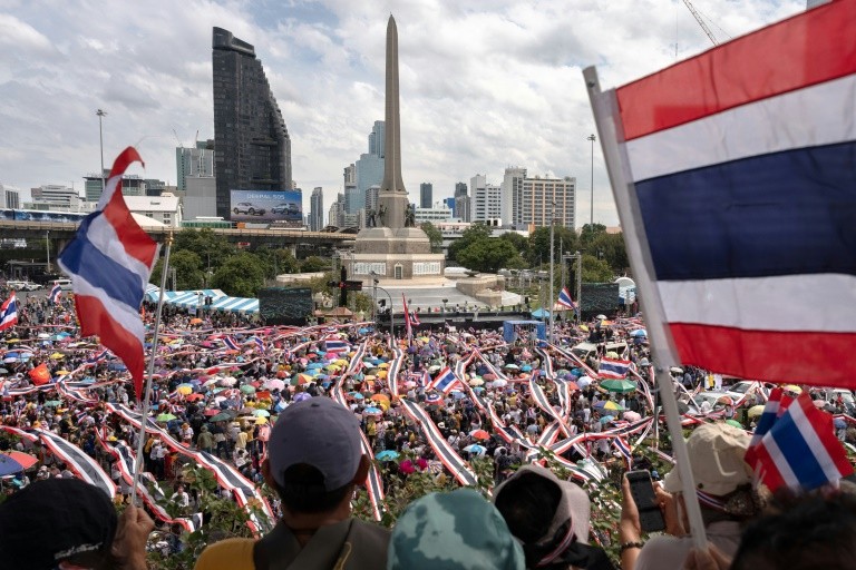Around 4,000 demonstrators filled roads ringing the capital's Victory Monument, waving Thai flags and cheering for speeches interspersed with live music