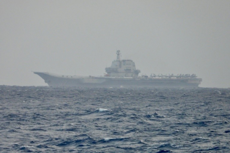 China said that two of its aircraft carrier groups had returned from carrying out combat drills in the western Pacific Ocean