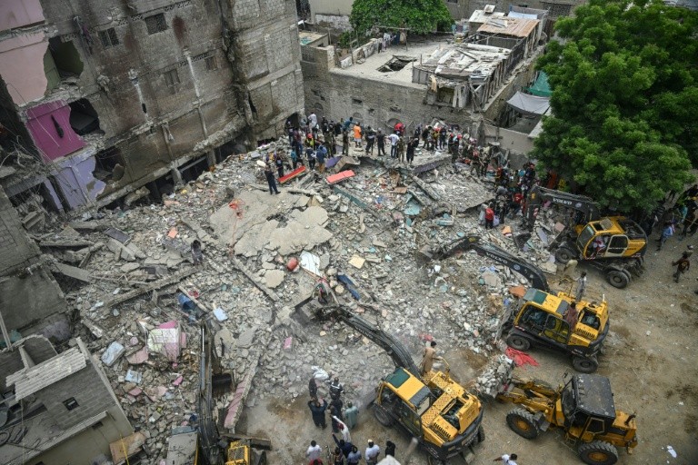 Up to 100 people had been living in the building, senior police officer Arif Aziz told AFP