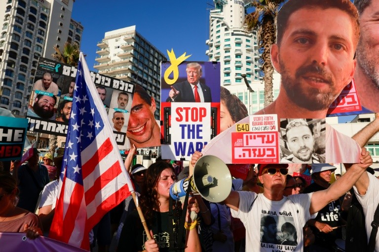 Israel's Prime Minister Benjamin Netanyahu is under pressure to secure a deal and return the hostages