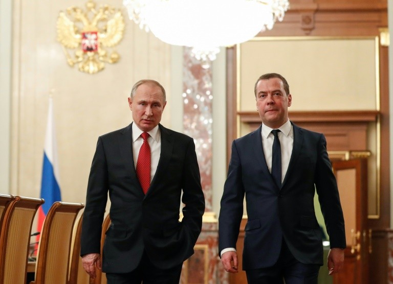Medvedev played down the idea there was any radical difference between him and Putin