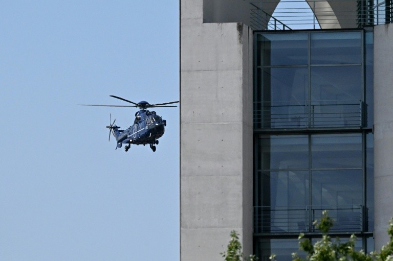 A helicopter carrying Ukrainian President Volodymyr Zelensky arrives at the Chancellery in Berlin