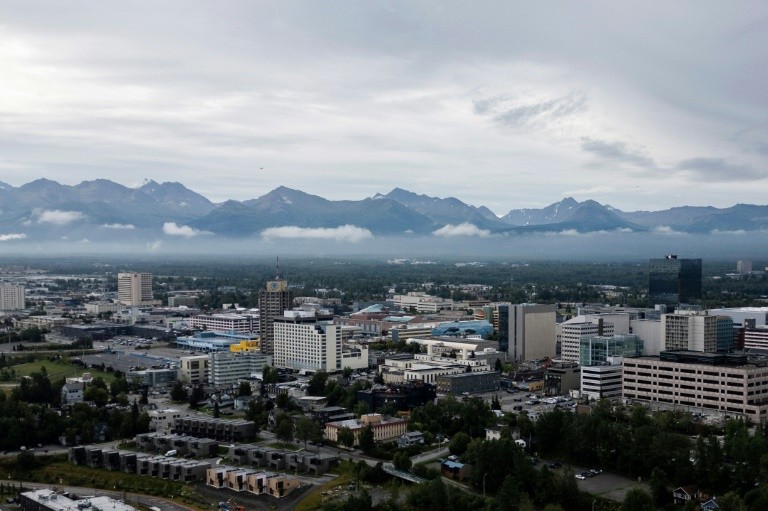 The summit will be held at a US Air Force base outside of Alaska's largest city of Anchorage, where protesters have put up signs to show solidarity with Ukraine