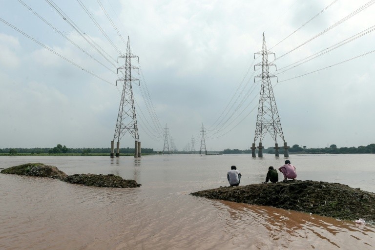 Disaster officials in Pakistan issued emergency alerts and advised those living near three flood-swollen rivers in Pakistan's Punjab province to move to safer locations during a brutal monsoon season