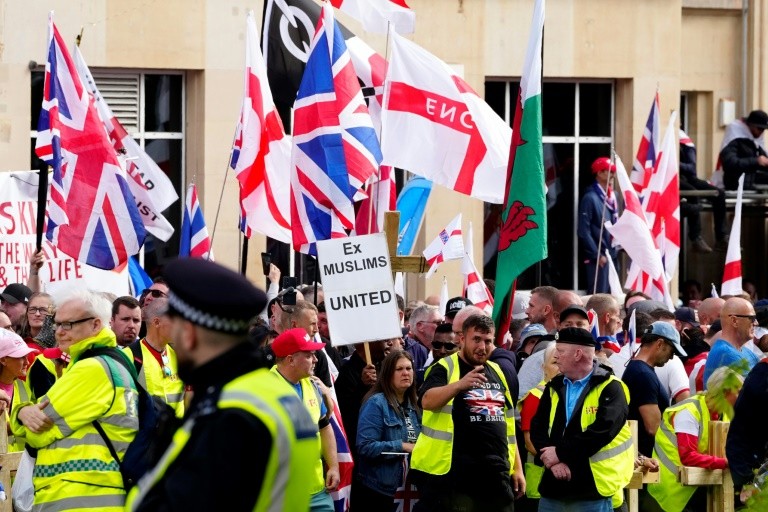 Crowds at far-right activist Tommy Robinson's latest 'Unite the Kingdom' march Saturday