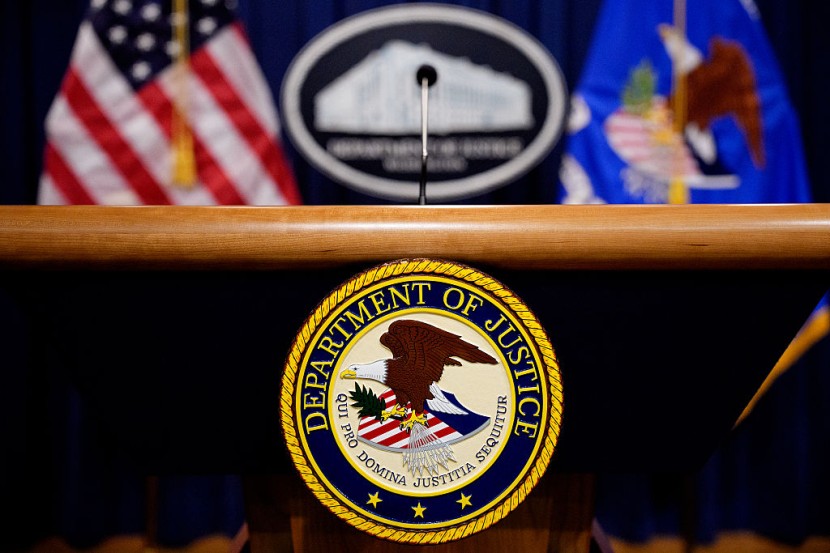 The Department of Justice seal and logo
