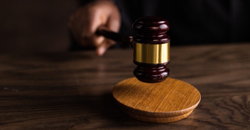 Brown Wooden Gavel on Brown Wooden Table