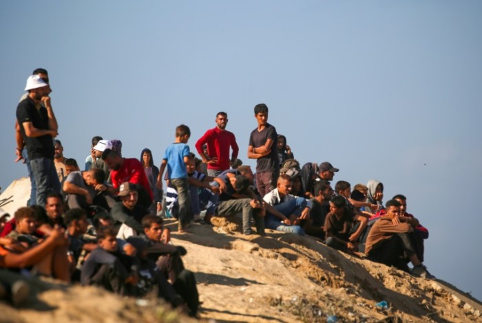 Displaced Palestinian civilians were at first nervous to return to their homes as Israeli forces beagn a ceasefire, but a trickle soon turned into a flood of people heading north to Gaza City
