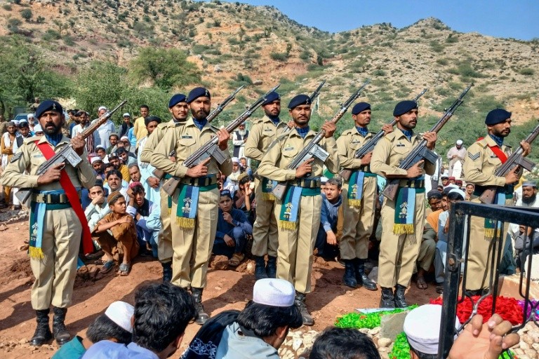 Pakistan troops at a fduneral for a colleague in border clashes with Afghanistan in Khyber Pakhtunkhwa province