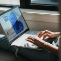 Person Working on Windows 11 Laptop