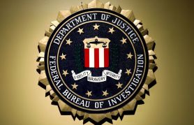 The Federal Bureau of Investigation seal is seen at FBI headquarters before a news conference by FBI Director Christopher Wray on the U.S Justice Department's inspector general's report regarding the actions of the Federal Bureau of Investigation and the