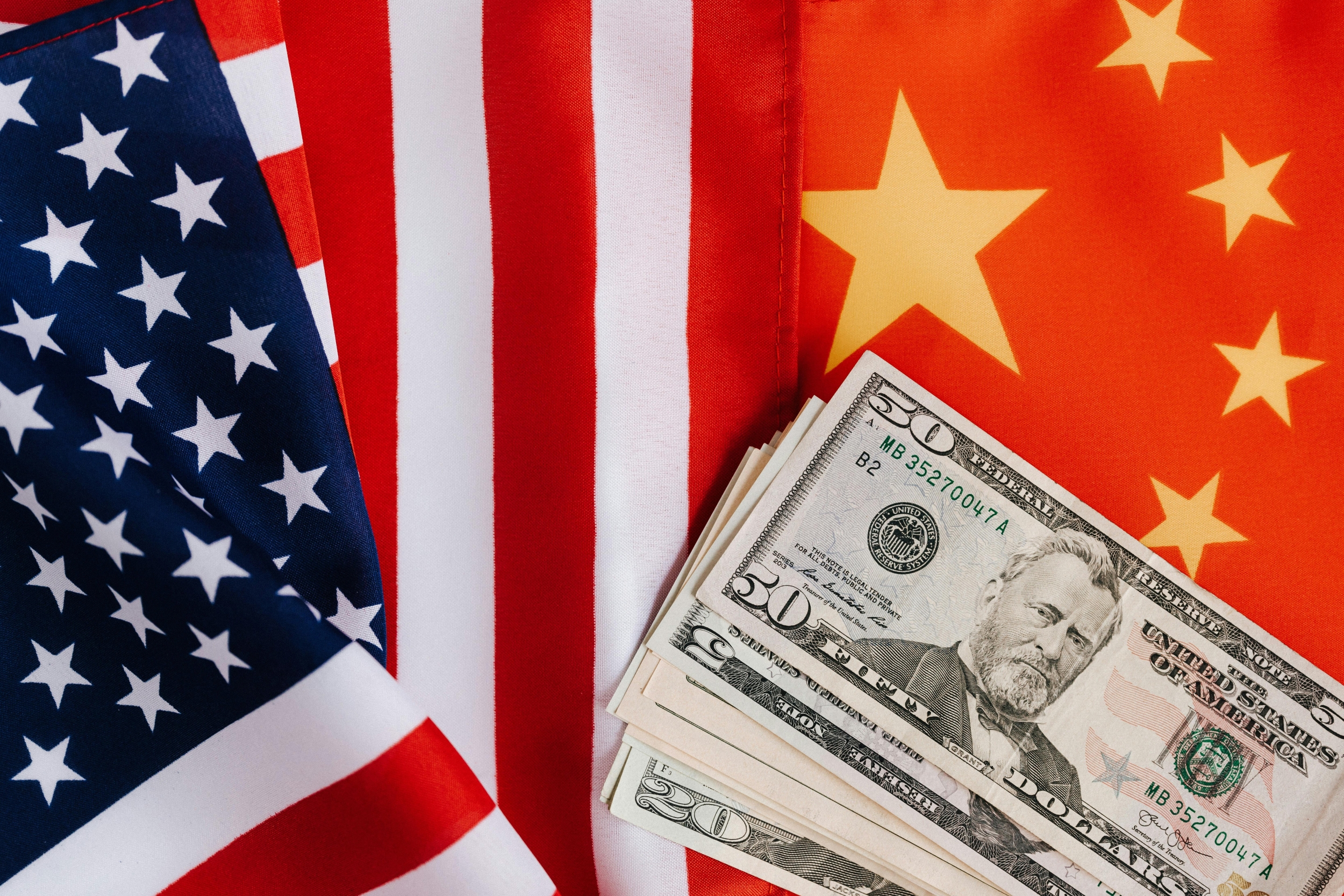 U.S.-China Flags and Dollars Ahead of High-Stakes Summit