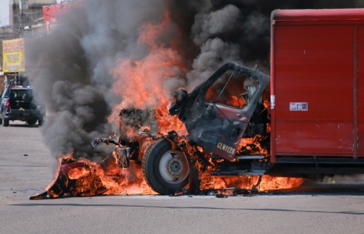 A truck burns in the Mexican cartel stronghold of Culiacan, which has been hit by gang infighting, murders and arson