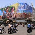 Iran billboard of Khomeini and Khamenei in central Tehran, June