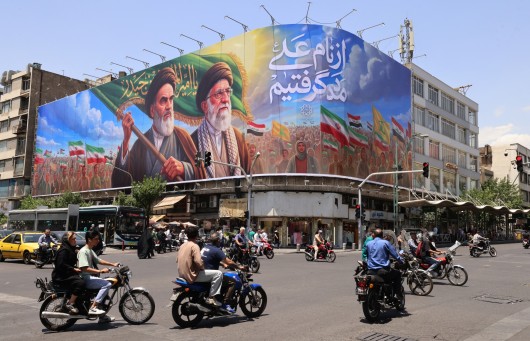 Iran billboard of Khomeini and Khamenei in central Tehran, June