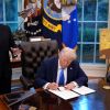 Trump signs H-1B fee executive order, Oval Office, Sept. 19