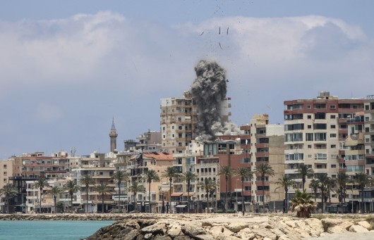 Smoke rises after an Israeli airstrike on Tyre