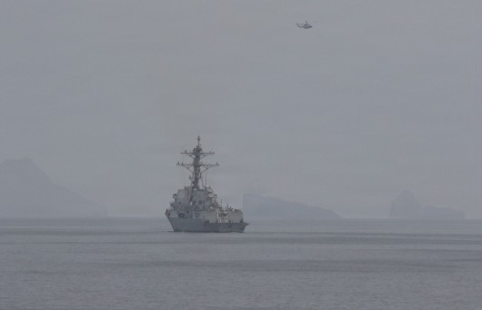 U.S. Navy destroyers operate in the Strait of Hormuz