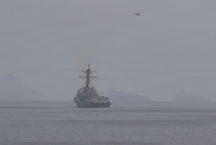 U.S. Navy destroyers operate in the Strait of Hormuz