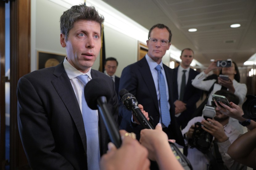 OpenAI CEO Sam Altman speaks to reporters in Washington